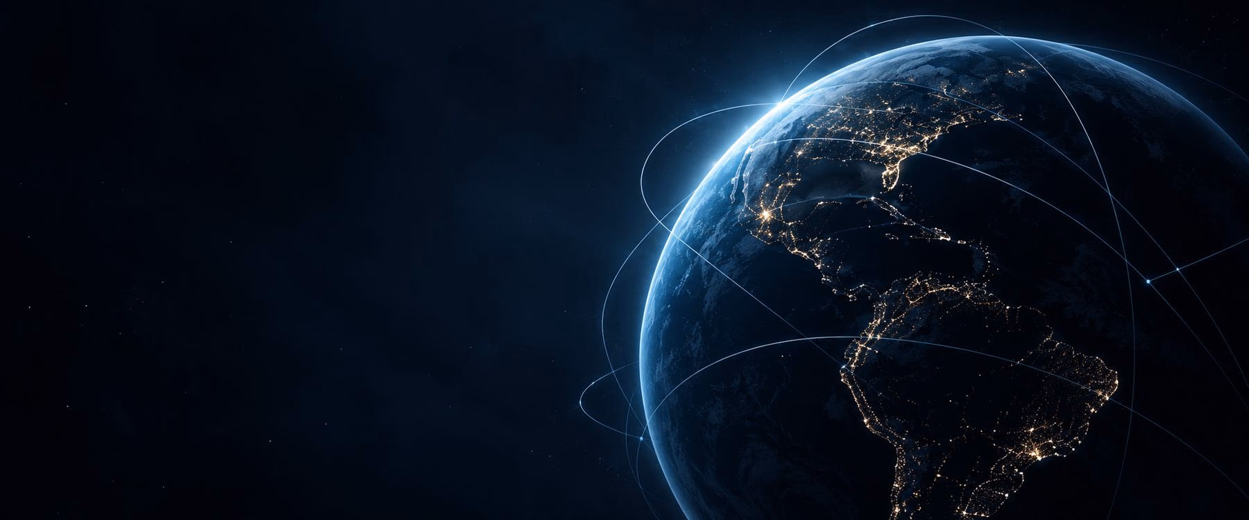 Earth at night seen from orbit, city lights linked by a glowing network